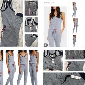 THIS SOFT PIQUE JUMPSTART HAS A COLORFUL DRAWSTRING BLOUSON WAIST, TAPERED LEGS